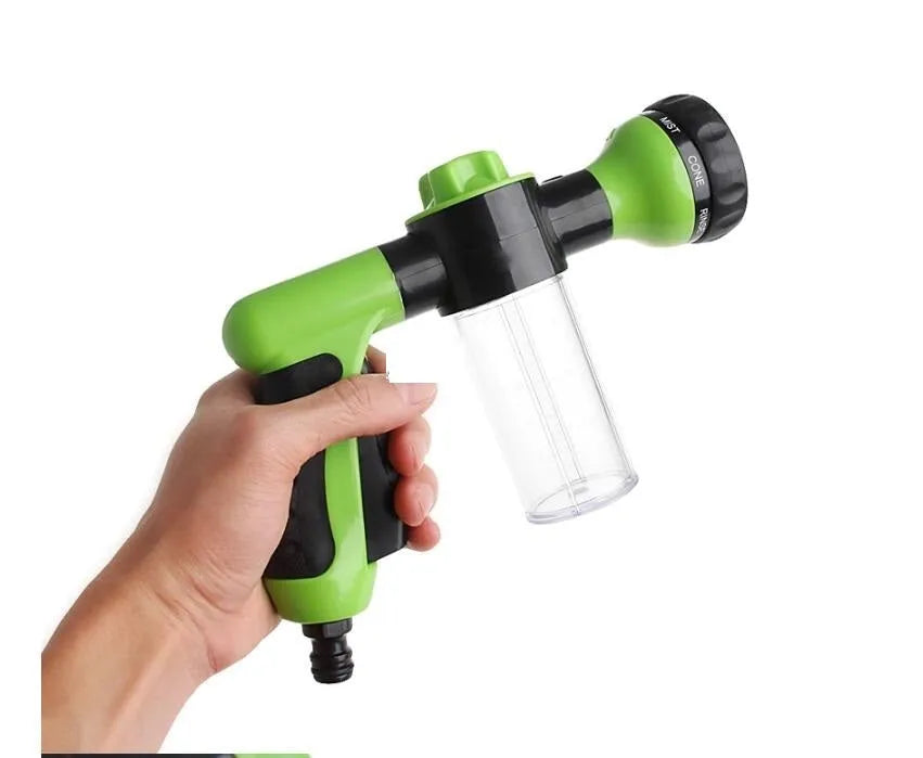 Green high pressure foam spray gun with adjustable nozzle for car washing and household cleaning.