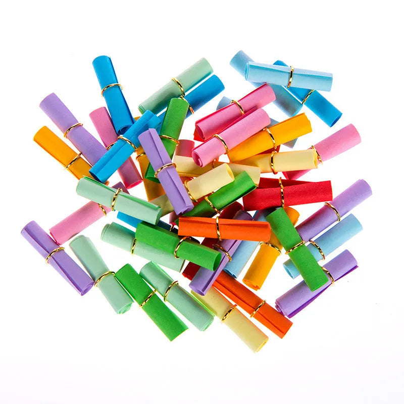 Assorted colourful scroll-style paper notes with metal eyelets in four different sizes.