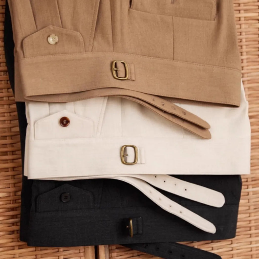 Men's slim fit straight leg business trousers in dark grey, made from wrinkle-resistant polyester fabric.