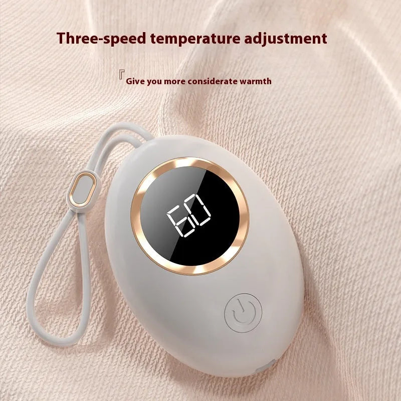 USB-powered hand warmer with digital display in six colour options including blue, green, pink and white finishes