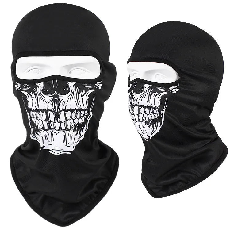 Breathable Bakool silk motorcycle skull mask in a graphic design, laid flat showing its 36cm by 29cm size.