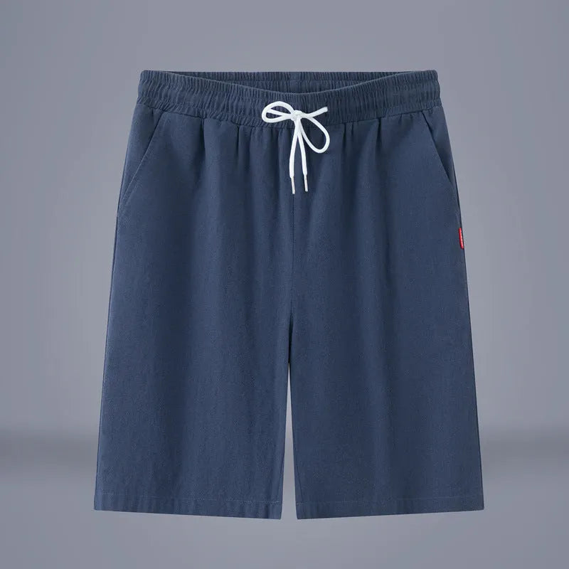 Cotton-linen blend cropped pants in a solid colour with a drawstring waist, shown in a mid-length cut.
