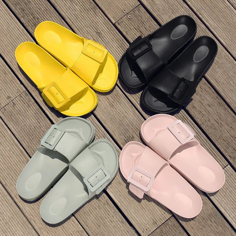 Women's grey blue EVA flip-flops with a buckle strap on a soft sole.
