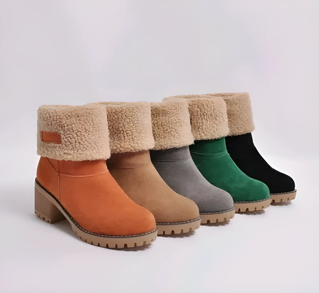 Women's suede mid-calf snow boots in multiple colours with a flat heel and round toe.