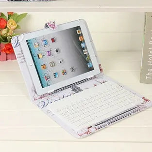 Wireless Bluetooth keyboard case for 7-inch tablet showing integrated keyboard and protective shell
