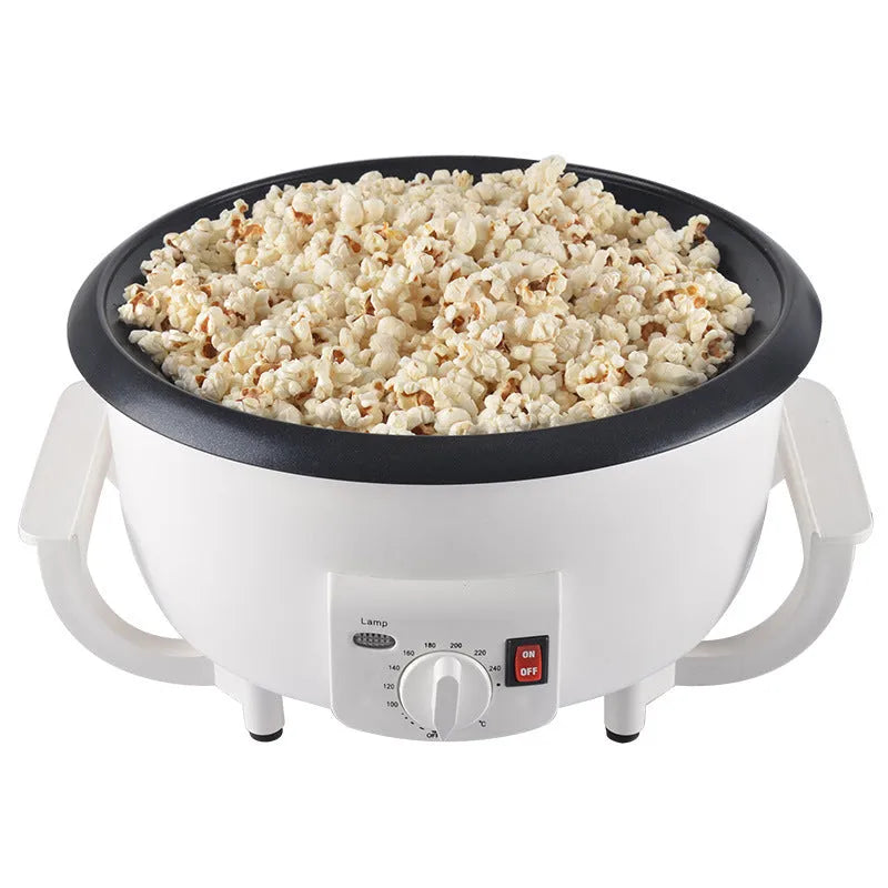 White electric coffee bean roasting machine with 750g capacity and oblate drum design on kitchen counter