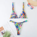 Women's floral print bikini swimsuit in briefs style with multi-colour patterns and polyester fabric construction