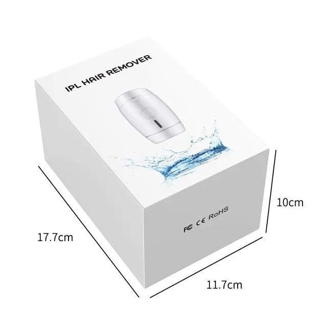 White home laser hair removal device with digital display, shown next to its power adapter and packaging box.