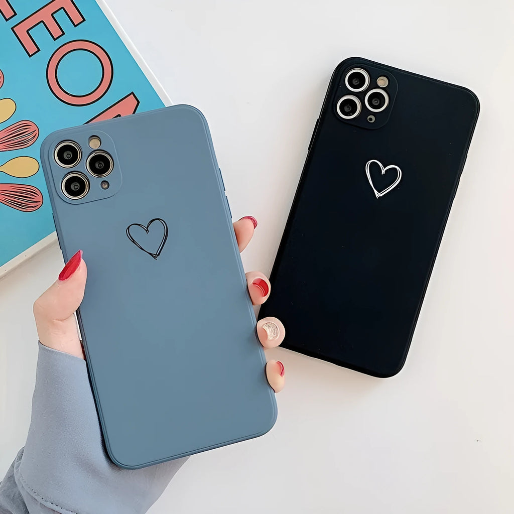 Silicone phone case for Apple iPhones in multiple solid colours including black, white, and pastel options