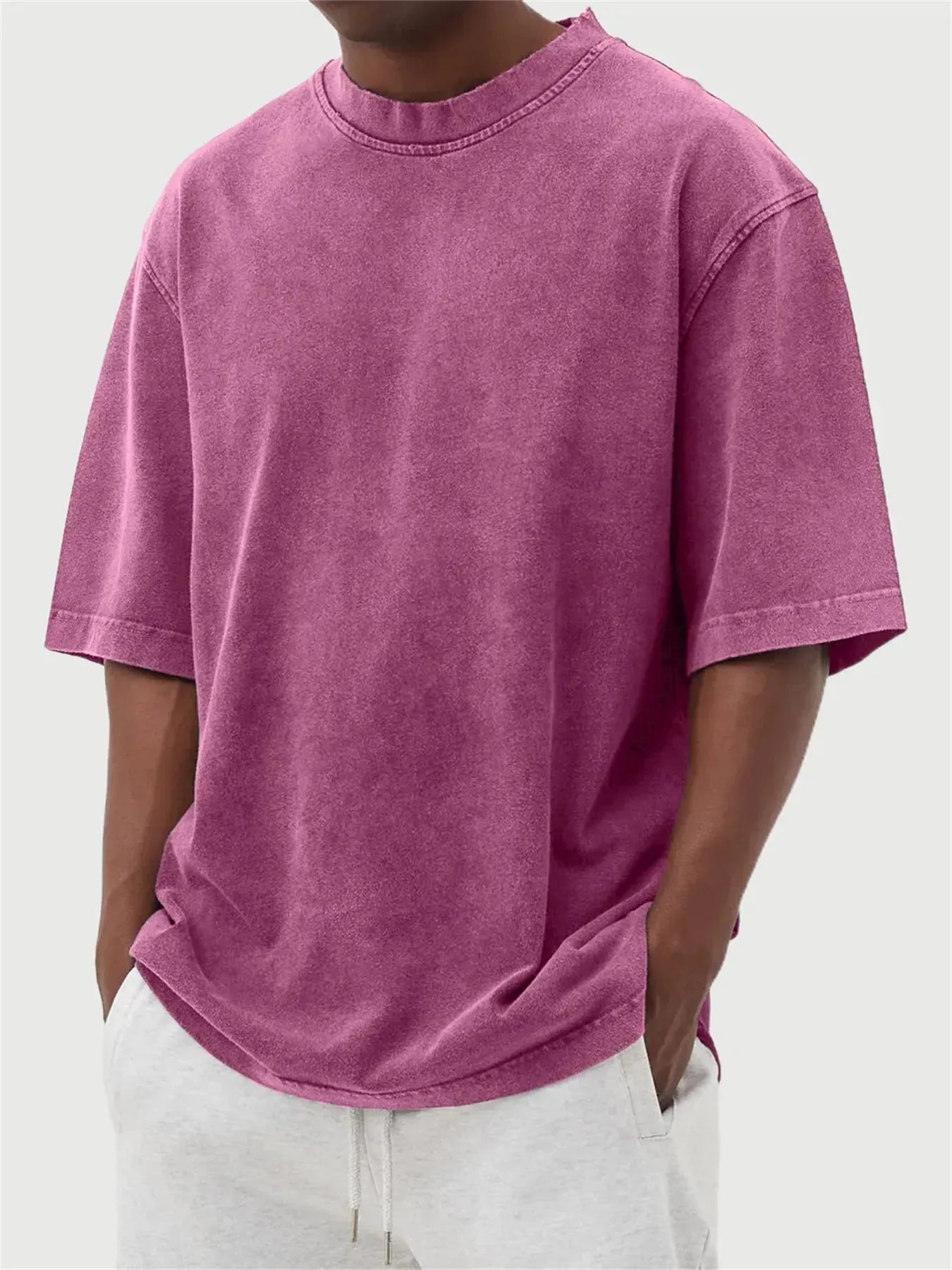Men's washed distressed pullover t-shirt in solid colour with loose fit and stone washed finish