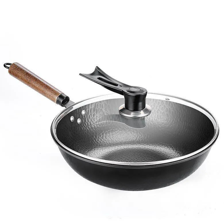 Traditional black iron wok pan with wooden handle measuring 40cm
