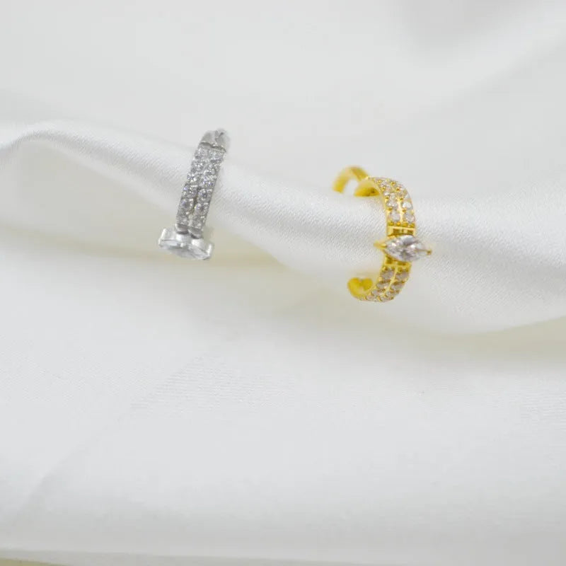 Gold and silver titanium steel heart earrings with zircon stones measuring 1.2x8mm