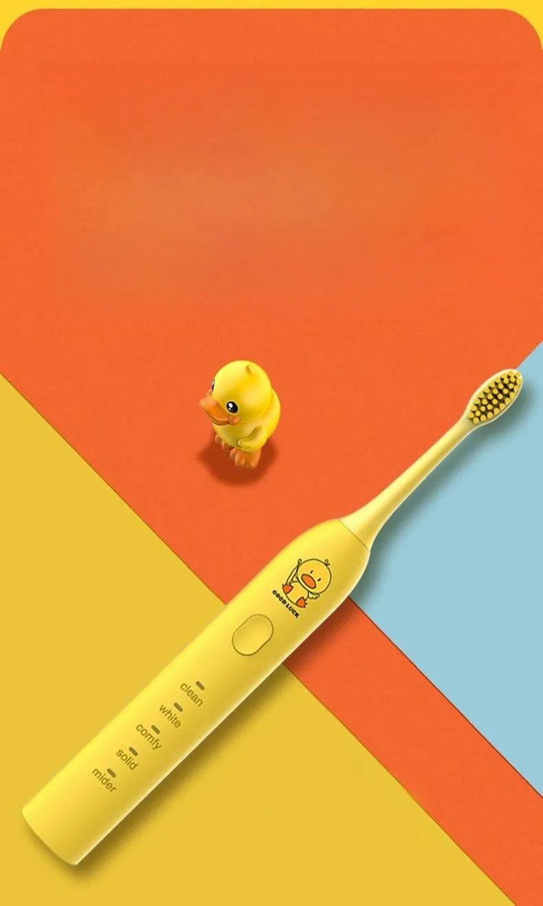 Small yellow duck USB rechargeable electric toothbrush with soft bristles in yellow colour