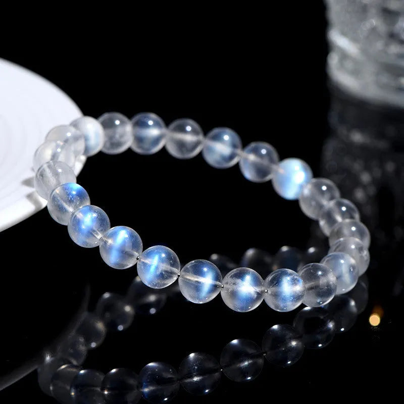 Natural cream body blue moonlight crystal bracelet showing crystal elements and simple construction