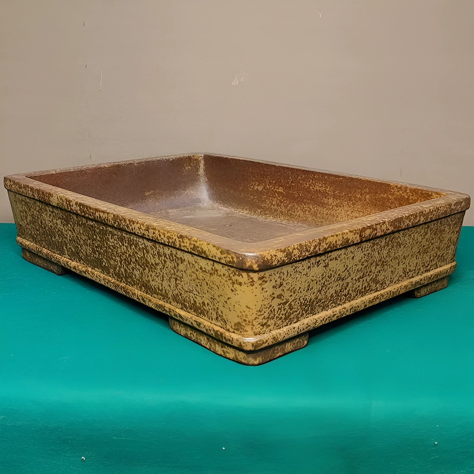 Straight shallow rectangular Yixing Fine Zisha flowerpot in purple sand clay for corridor plant display.