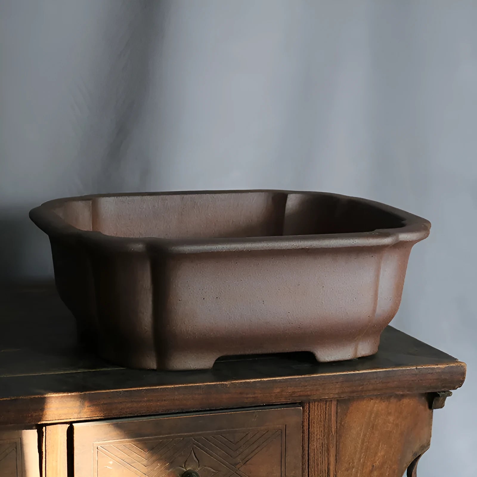 Purple sand rectangular bonsai flower pot on floor with modern ceramic finish