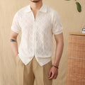 Light coffee coloured zip-front cardigan with short sleeves and a lapel collar laid flat.