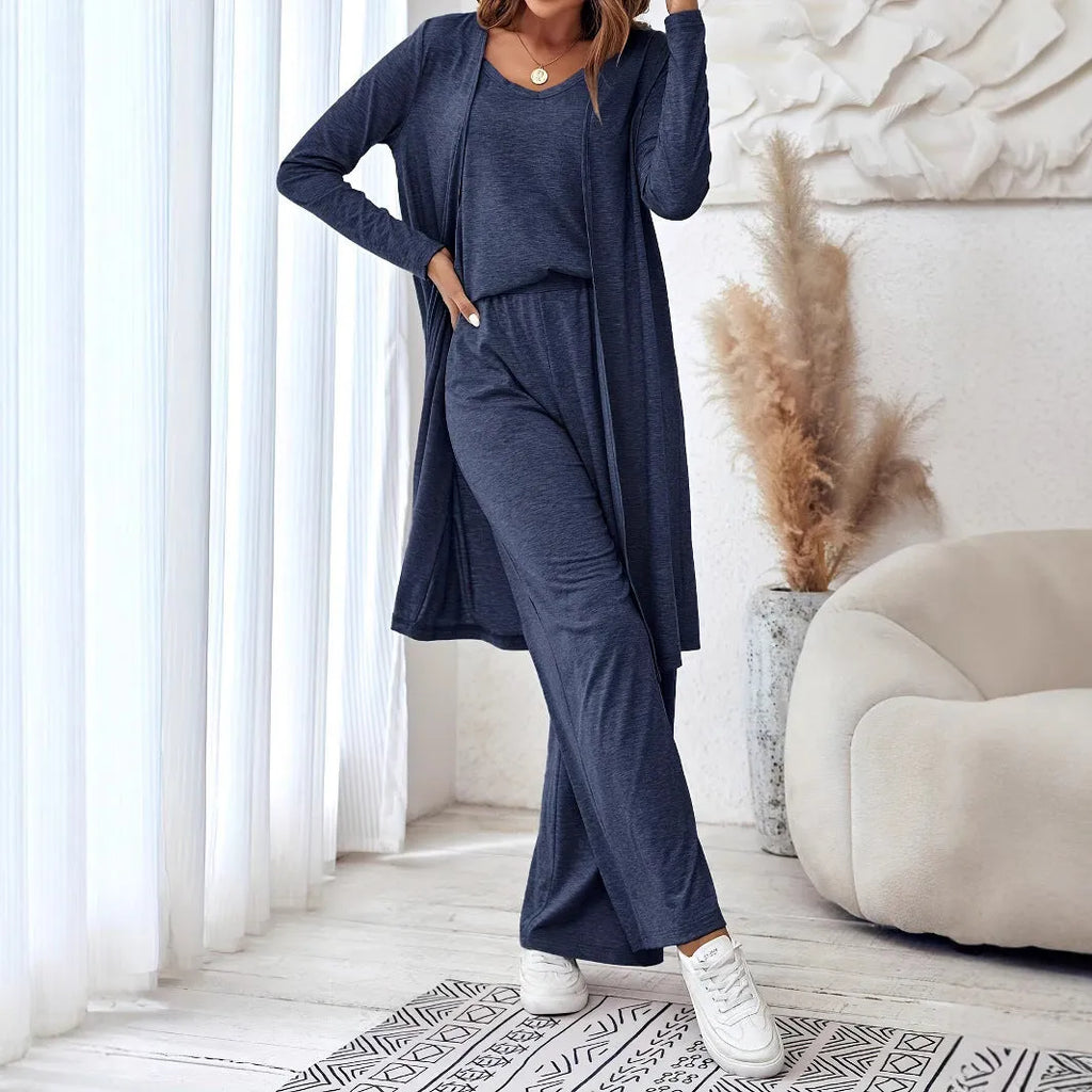 Blue women's casual suit set with cardigan, long trousers, and suspenders on a hanger.