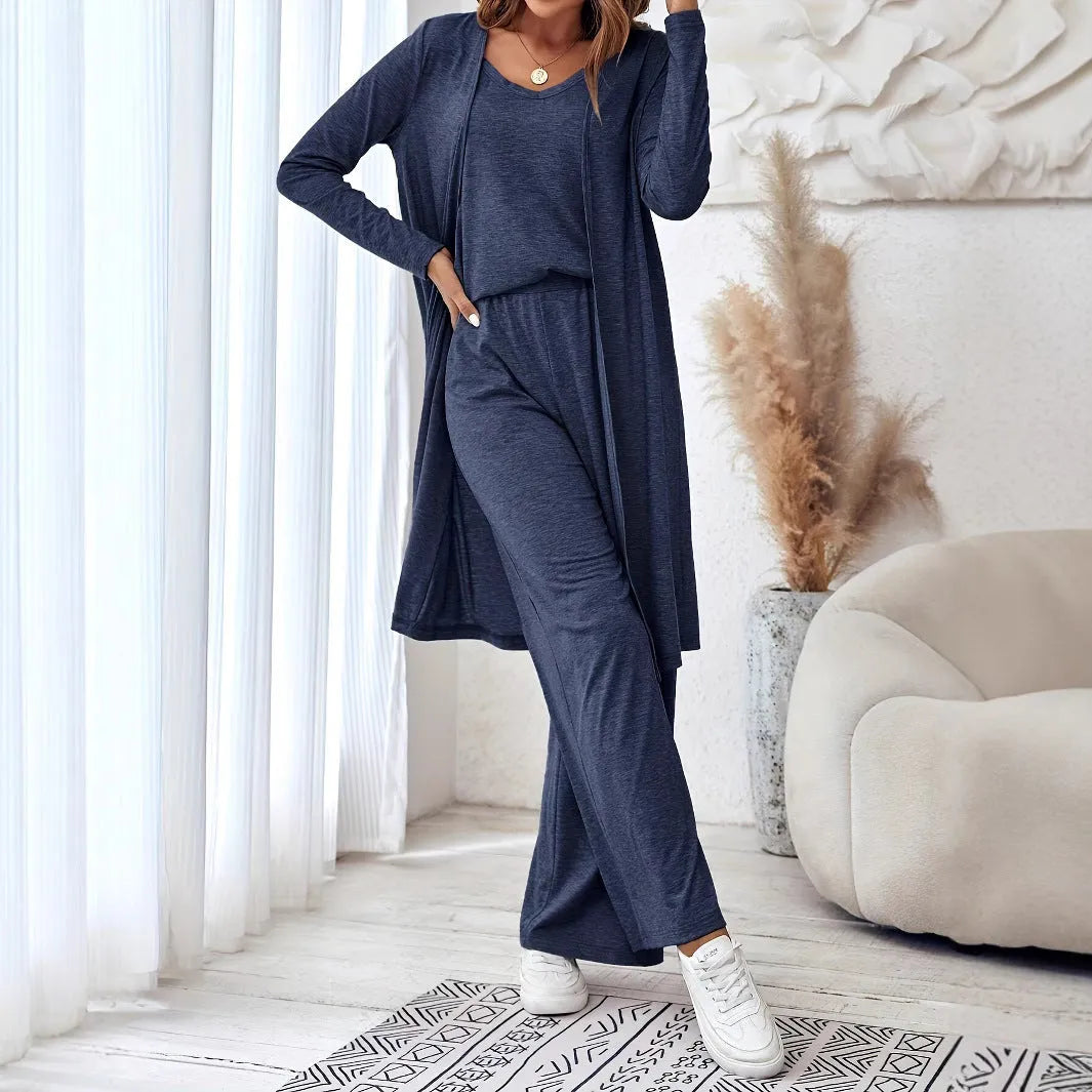 Blue women's casual suit set with cardigan, long trousers, and suspenders on a hanger.