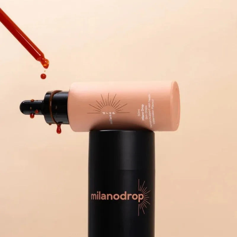 Matte sun tanning black liquid showing 50ml tanning drops bottle and 75ml tanning flash cream tube