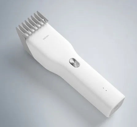 Black cordless electric hair clippers with a ceramic cutter head and a white adjustable length comb attached.