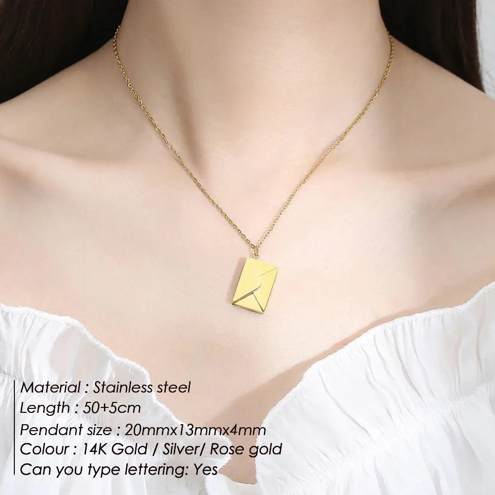 Gold envelope-shaped locket pendant on a stainless steel chain with custom engraving option