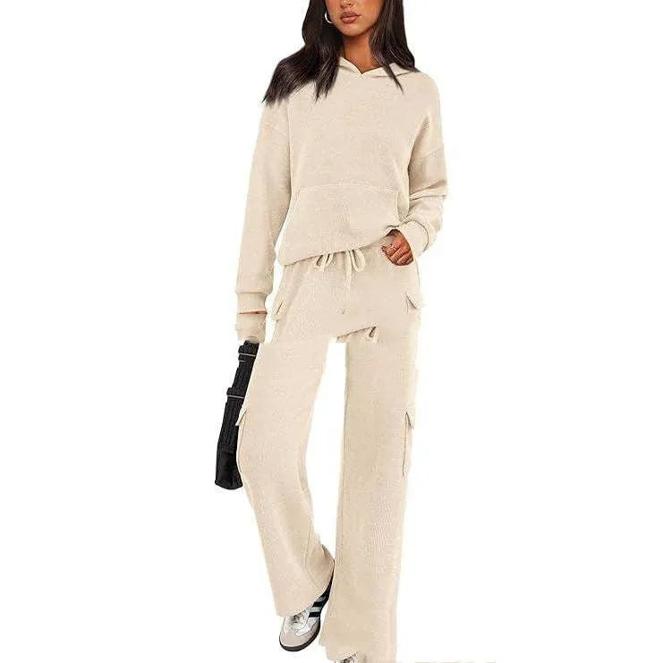 Women's polyester leisure sports suit with regular sleeves and matching trousers in multiple colour options