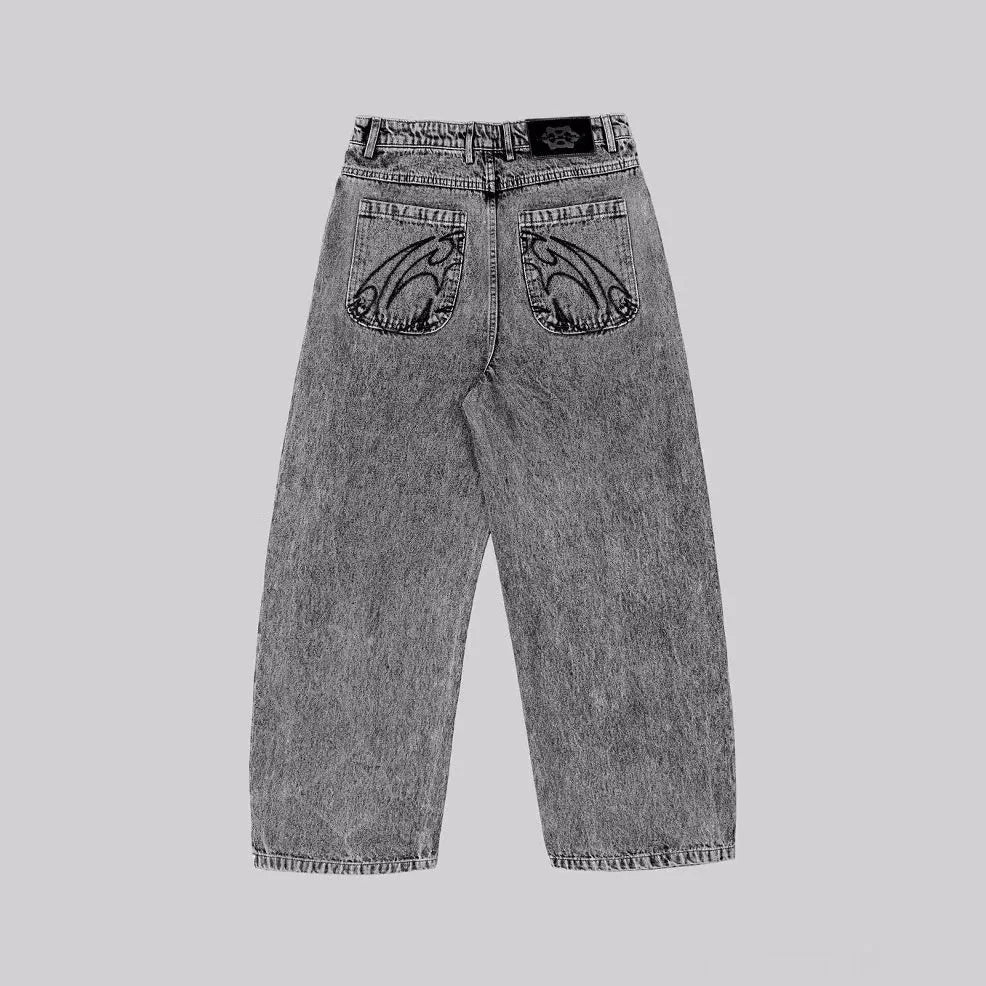 Grey loose straight-leg denim trousers with mid-waist styling on hanger