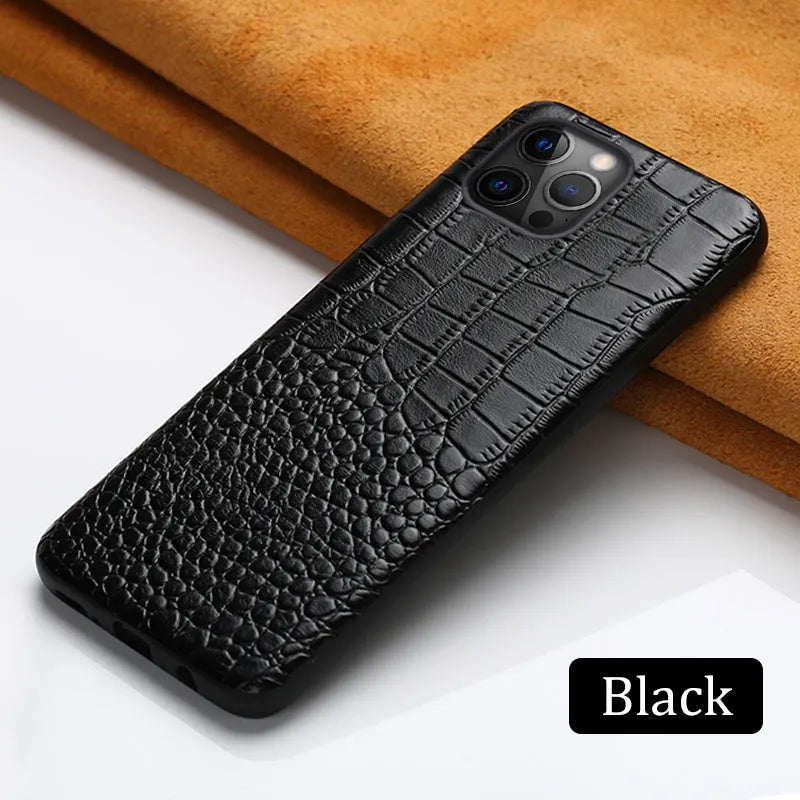 Handmade leather iPhone case featuring a crocodile pattern texture in black, red, brown, or blue.