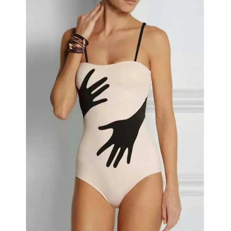 Women's one-piece style bikini two-piece swimsuit set with a white tulle skirt.