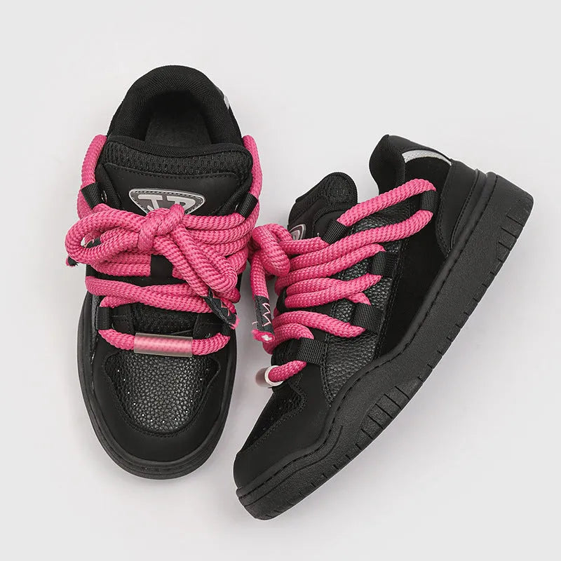 Low-top unisex casual shoes in denim blue with white rubber sole and lace-up front.