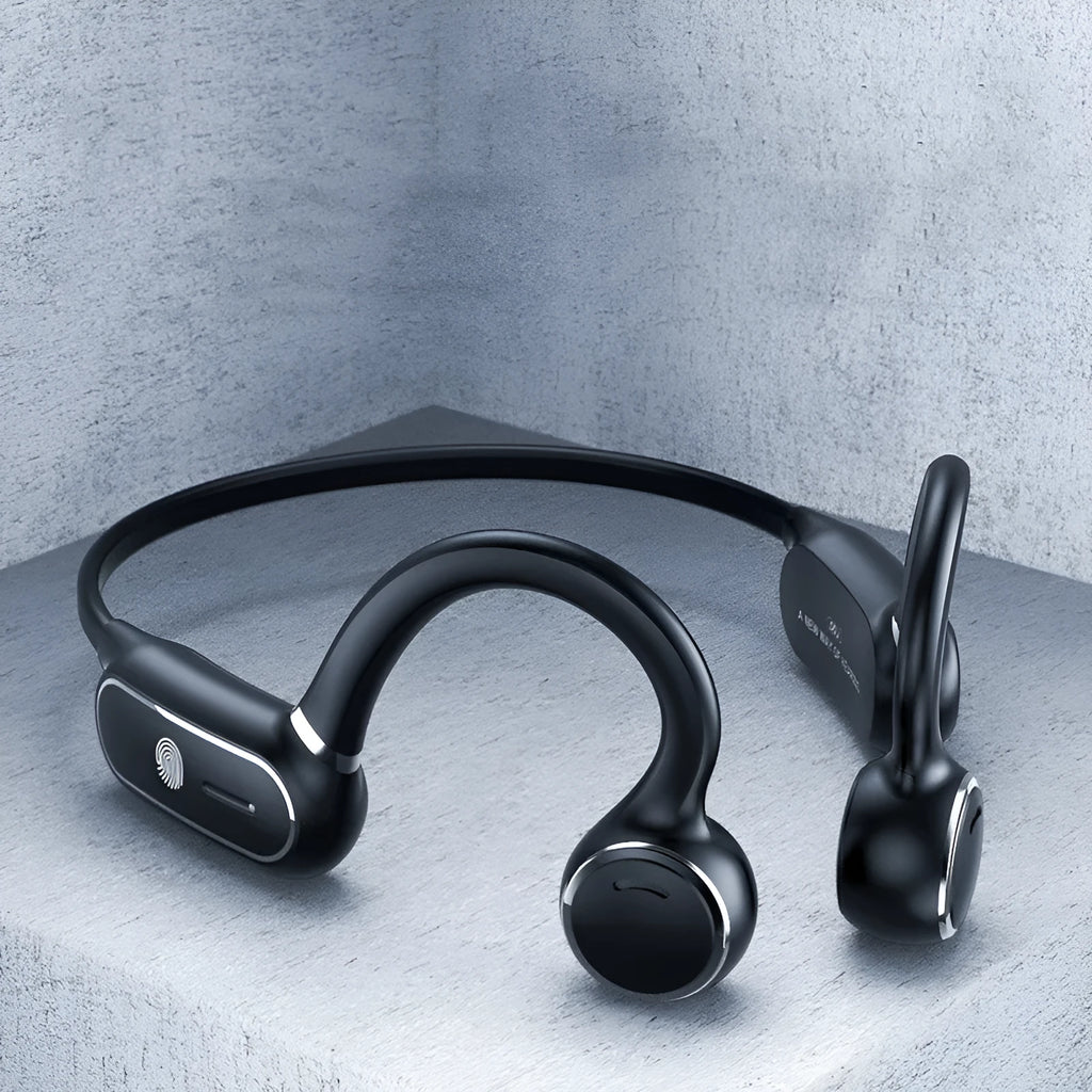 Black air conduction wireless earphones with titanium frame showing ergonomic ear-hanging design
