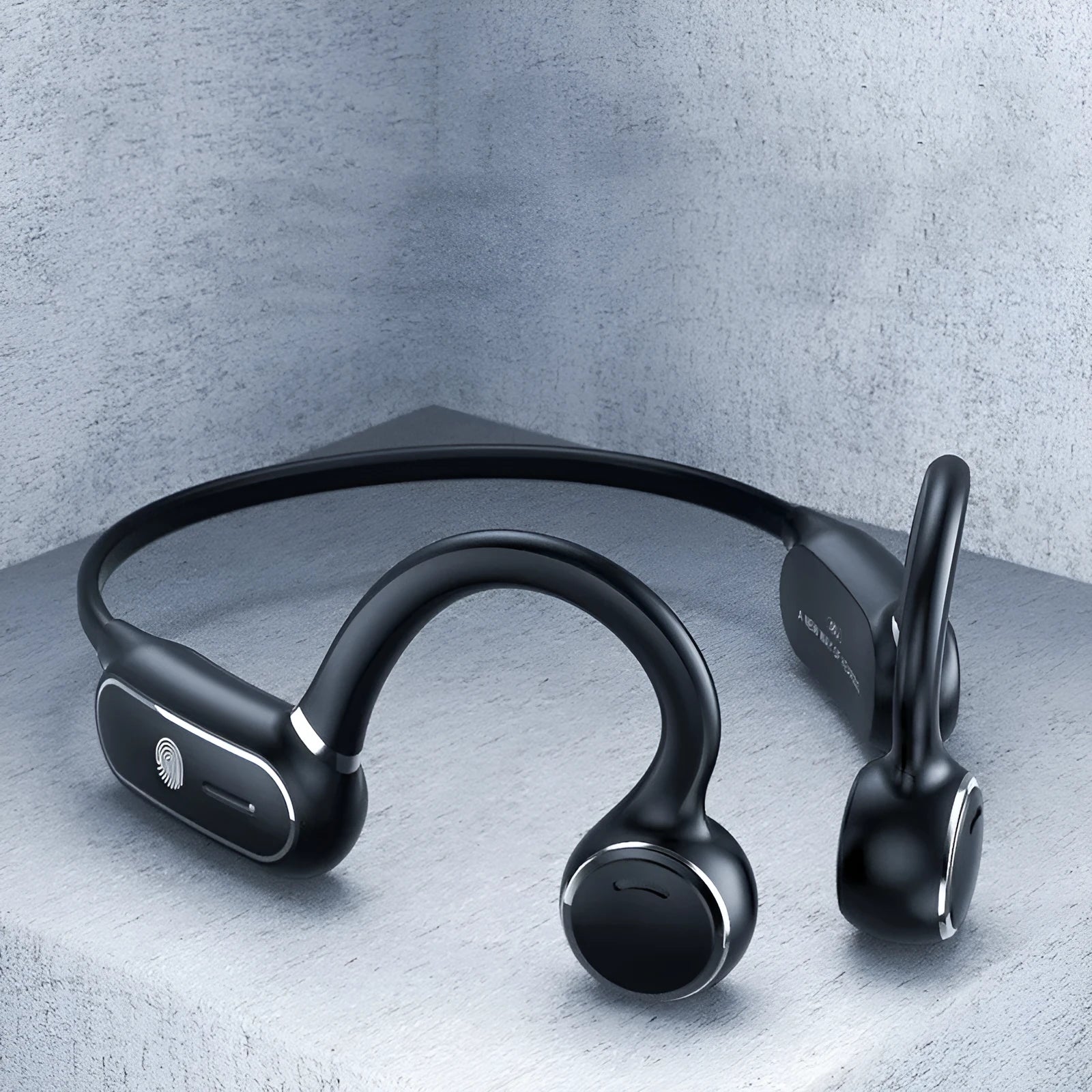 Black air conduction wireless earphones with titanium frame showing ergonomic ear-hanging design