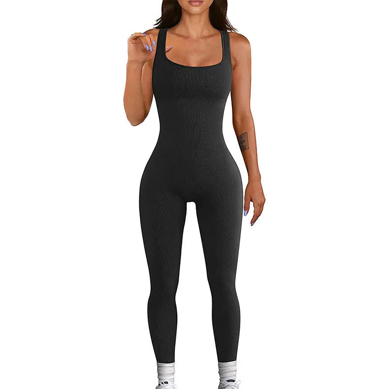 Women's beige spandex suspender tank top tights with button detail, shown at full length.