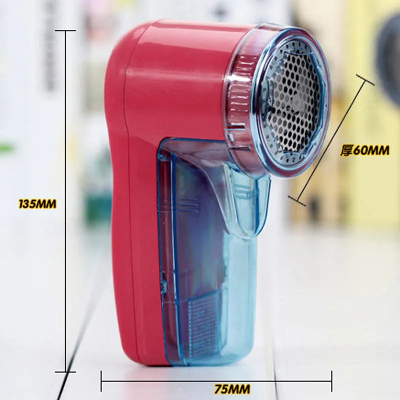 Portable electric lint remover unit showing compact design with collection compartment