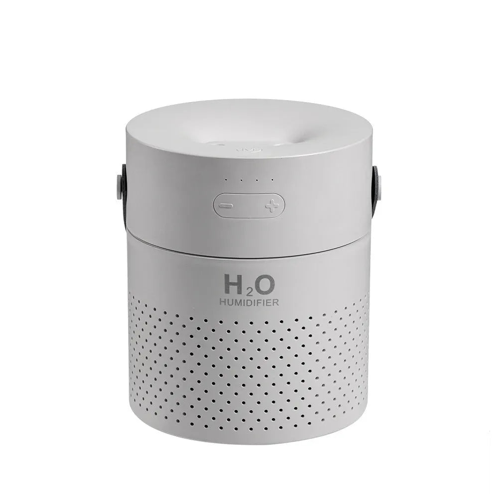 Green wireless bedroom humidifier with colour-changing light and USB port on a bedside table