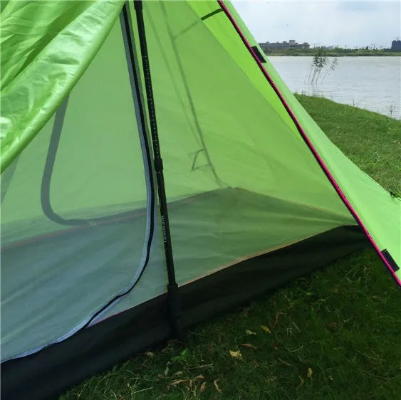 Poleless gold-shaped double layer camping tent in green on grass, 270x160x130cm
