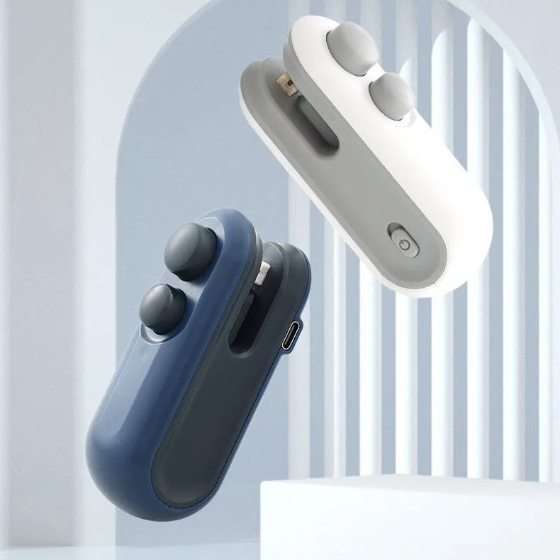 Handheld bag heat sealer in white and blue with USB charging port and cutter blade