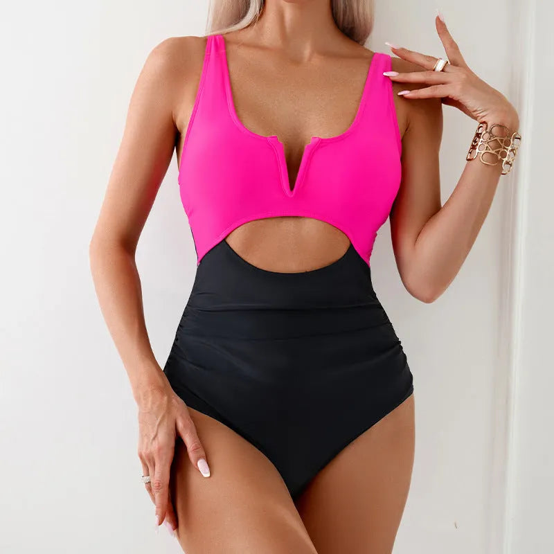 Women's colour block one-piece swimsuit in nylon fabric showing contrast colour design