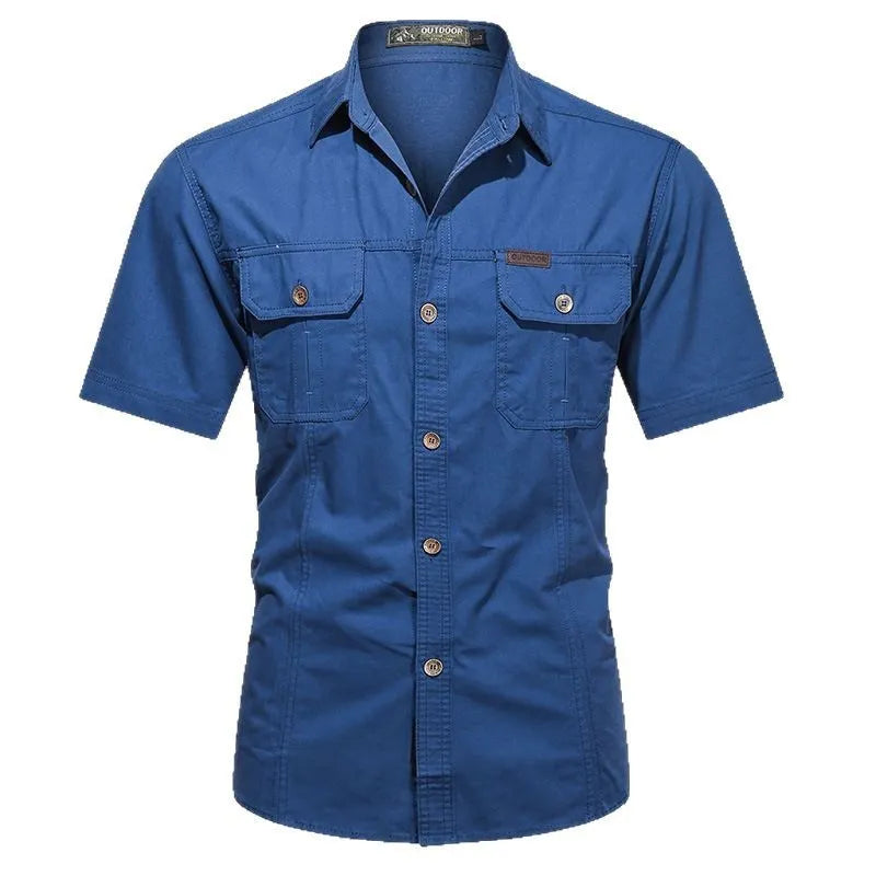 Men's loose-fitting short sleeve cotton work shirt in army green, laid flat.