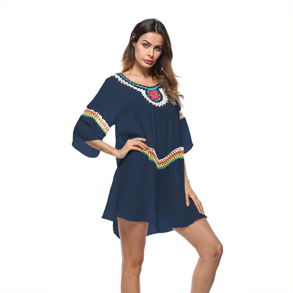 Crocheted ethnic style women's sun protection clothing in apricot colour for beach wear.