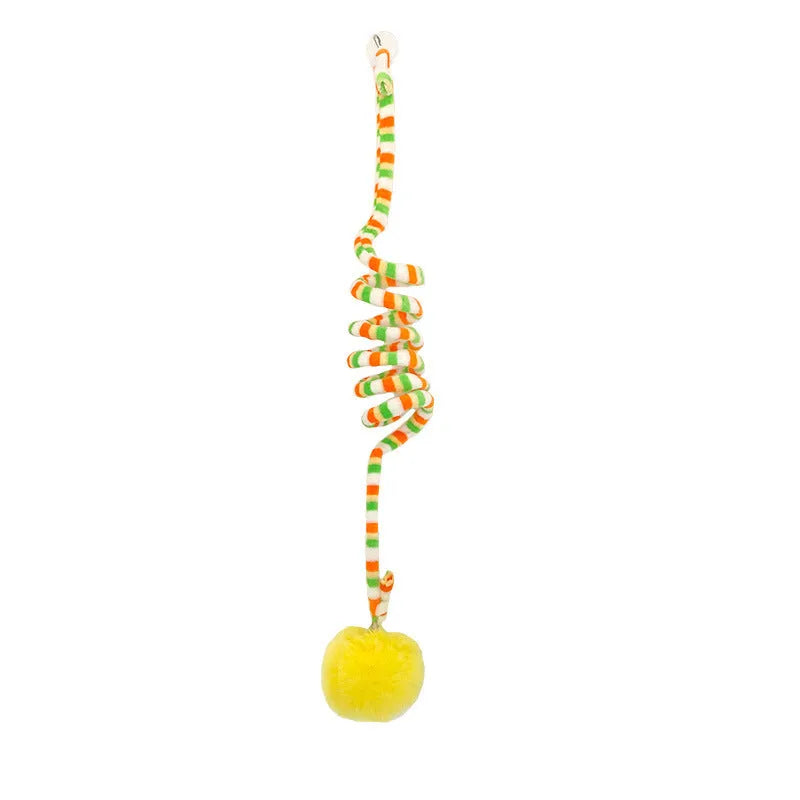 Kitten playing with hanging spring toy featuring inflatable ball and suction cup mount in various colours