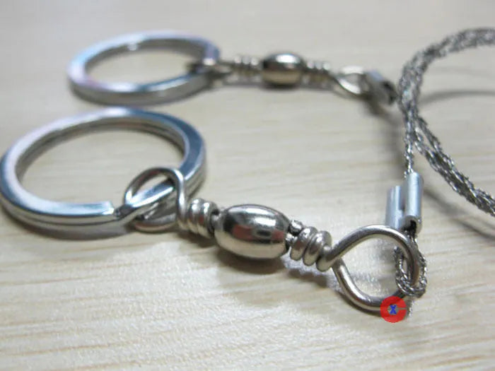 70cm stainless steel survival wire saw with thumb rings showing 600mm cutting blade