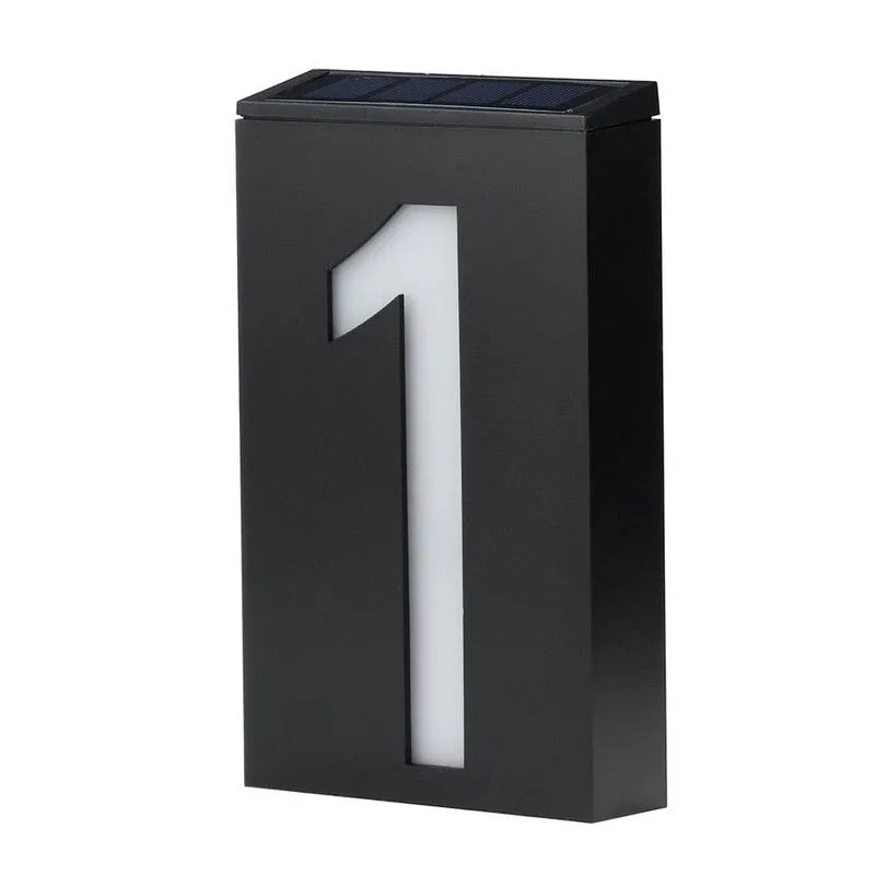 Solar powered white LED house number light mounted on a wall with IP65 waterproof rating