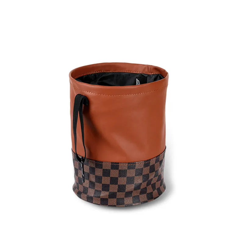 Black retractable leather car trash can with carry handle, shown folded and expanded