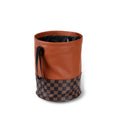 Black retractable leather car trash can with carry handle, shown folded and expanded