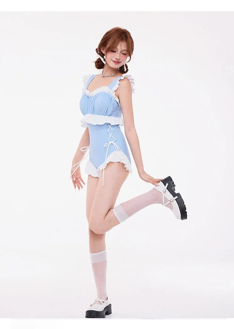 Light blue high-waist one-piece swimsuit with lace gather detail on front.