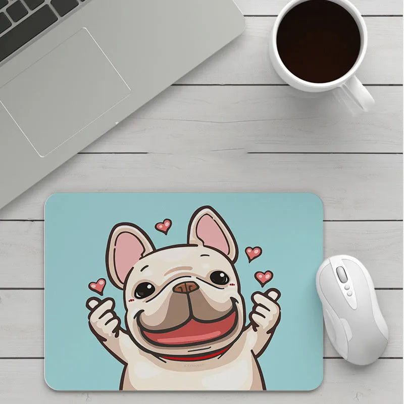 Custom cartoon thickening mouse pad on a desk, showing a colourful design with black stitched edge.