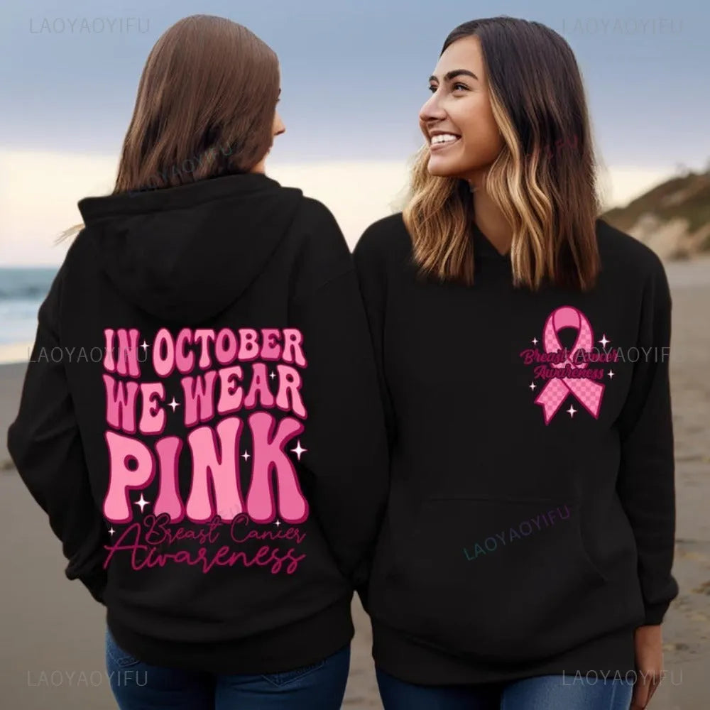 Pink breast cancer awareness pullover hoodie with a retro hot stamping pattern and a side seam pocket.