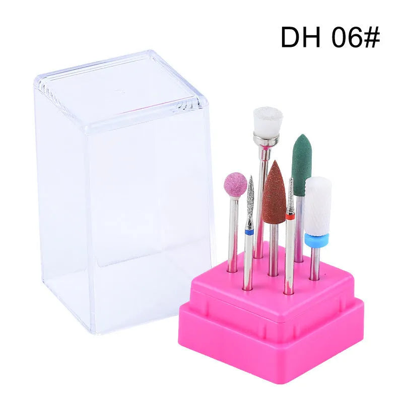 Tungsten steel nail drill bit set with 7 pieces including bits and brush in a clear case.